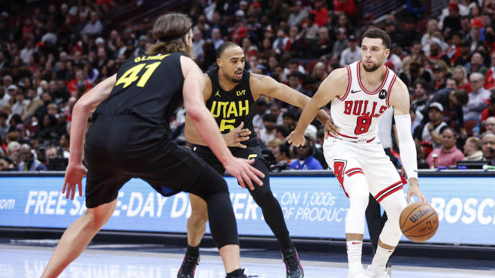 Nov 6, 2023; Chicago, Illinois, USA; Chicago Bulls guard Zach LaVine (8) drives to the basket against Utah Jazz forward Kelly Olynyk (41) during the second half at United Center. Mandatory Credit: Kamil Krzaczynski-USA TODAY Sports