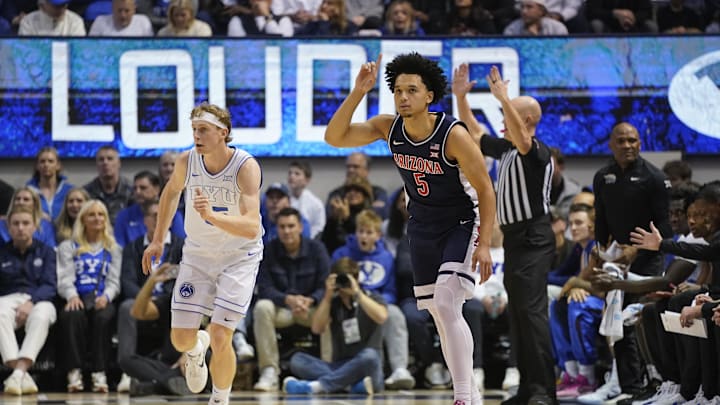 Jan 26, 2026; Provo, Utah, USA; Arizona Wildcats guard Brayden Burries (5) reacts to a three-pointer during the first half against the BYU Cougars at Marriott Center. Mandatory Credit: Aaron Baker-Imagn Images Jan 26, 2026; Provo, Utah, USA; Arizona Wildcats guard Brayden Burries (5) reacts to a three-pointer during the first half against the BYU Cougars at Marriott Center. Mandatory Credit: Aaron Baker-Imagn Images