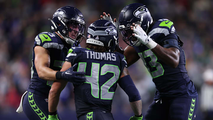Seattle Seahawks safety Ty Okada, linebacker Drake Thomas and linebacker Ernest Jones IV Seattle Seahawks safety Ty Okada, linebacker Drake Thomas and linebacker Ernest Jones IV