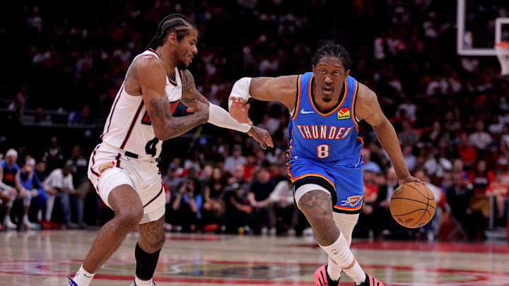 Oklahoma City Thunder forward Jalen Williams drives to the basket against Houston Rockets guard Jalen Green during the third quarter at Toyota Center. Mandatory Credit: Erik Williams-Imagn Images