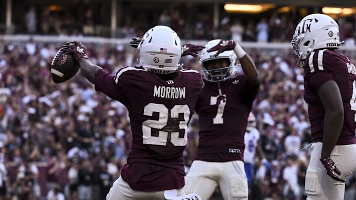 Oct 11, 2025; College Station, Texas, USA;  Texas A&M Aggies running back Jamarion Morrow (23) celebrates after scoring a touchdown during the first quarter against the Florida Gators at Kyle Field. Mandatory Credit: Maria Lysaker-Imagn Images 