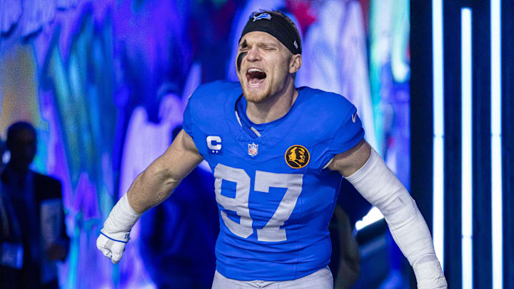 Nov 27, 2025; Detroit, Michigan, USA; Detroit Lions defensive end Aidan Hutchinson (97) runs onto the field prior to the game against the Green Bay Packers at Ford Field. Mandatory Credit: David Reginek-Imagn Images