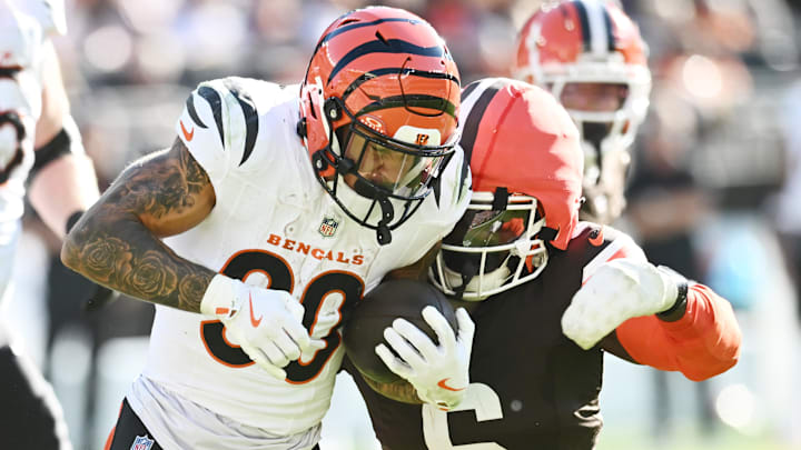 Oct 20, 2024; Cleveland, Ohio, USA; Cleveland Browns linebacker Jeremiah Owusu-Koramoah (6) tackles Cincinnati Bengals running back Chase Brown (30) during the second half at Huntington Bank Field. Mandatory Credit: Ken Blaze-Imagn Images Oct 20, 2024; Cleveland, Ohio, USA; Cleveland Browns linebacker Jeremiah Owusu-Koramoah (6) tackles Cincinnati Bengals running back Chase Brown (30) during the second half at Huntington Bank Field. Mandatory Credit: Ken Blaze-Imagn Images