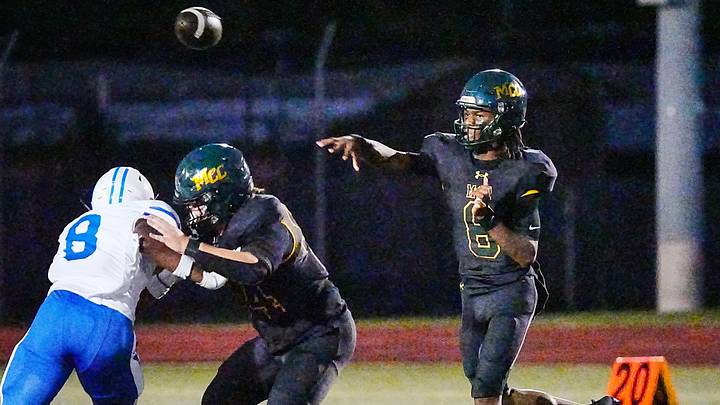 Trenton Washington passes the ball for Melbourne Central Catholic during a game against Wildwood on Sept. 25, 2026. MCC won 54-14.