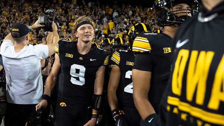 Iowa quarterback Hank Brown (9) looks happy after the Hawkeyes defeated Iowa State16-13. Iowa quarterback Hank Brown (9) looks happy after the Hawkeyes defeated Iowa State16-13.