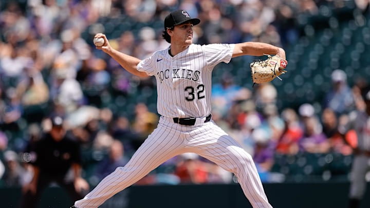 Apr 30, 2025; Denver, Colorado, USA; Colorado Rockies starting pitcher Chase Dollander (32) pitches in the second inning against the Atlanta Braves at Coors Field. Mandatory Credit: Isaiah J. Downing-Imagn Images
