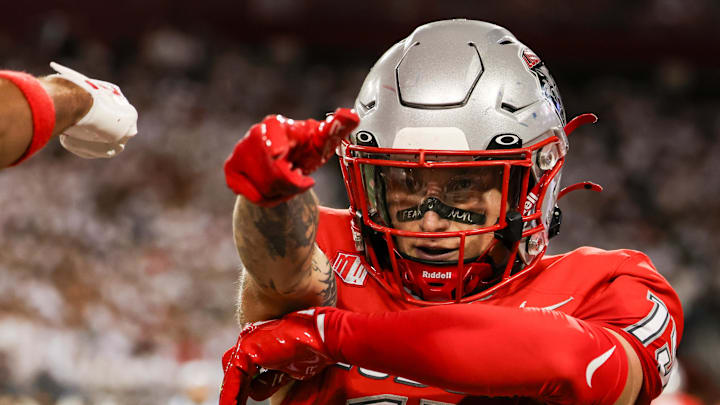 Aug 31, 2024; Tucson, Arizona, USA; New Mexico wide receiver Luke Wysong (15) celebrates touchdown during first quarter at Arizona Stadium. Mandatory Credit: Aryanna Frank-Imagn Images