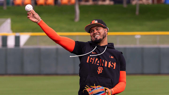 Feb 16, 2026; Scottsdale, AZ, USA; San Francisco Giants second baseman Luis Arraez throws during workouts at Scottsdale Stadium in Scottsdale, Arizona.  Mandatory Credit: Arianna Grainey-Imagn Images