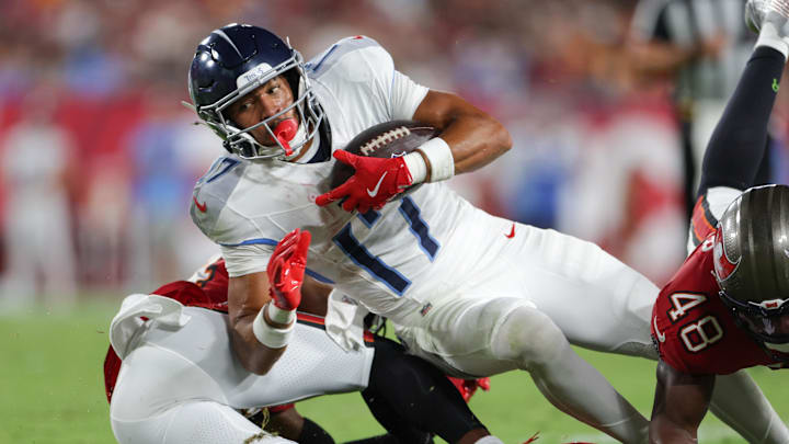 Tennessee Titans wide receiver Chimere Dike runs with the ball against the Tampa Bay Buccaneers.