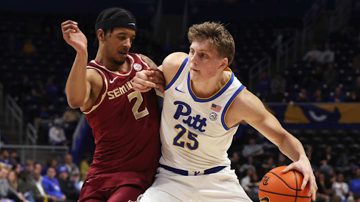 Mar 4, 2026; Pittsburgh, Pennsylvania, USA; Florida State Seminoles guard Cam Miles (2)  defends Pittsburgh Panthers guard Nojus Indrusaitis (25) during the first half at the Petersen Events Center. Mandatory Credit: Charles LeClaire-Imagn Images
