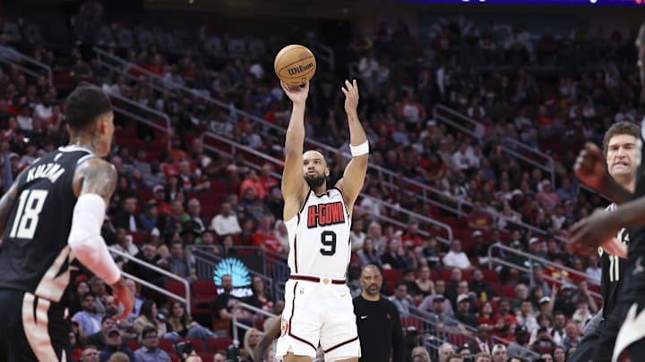 Feb 25, 2025; Houston, Texas, USA; Houston Rockets forward Dillon Brooks (9) shoots the ball during the second quarter against the Milwaukee Bucks at Toyota Center. Mandatory Credit: Troy Taormina-Imagn Images