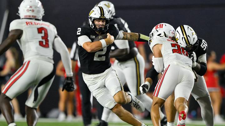 Sep 5, 2026; Nashville, Tennessee, USA; Vanderbilt Commodores quarterback Jared Curtis (2) runs with the ball against the Austin Peay Governors during the second half at FirstBank Stadium. Mandatory Credit: Steve Roberts-Imagn Images Sep 5, 2026; Nashville, Tennessee, USA; Vanderbilt Commodores quarterback Jared Curtis (2) runs with the ball against the Austin Peay Governors during the second half at FirstBank Stadium. Mandatory Credit: Steve Roberts-Imagn Images