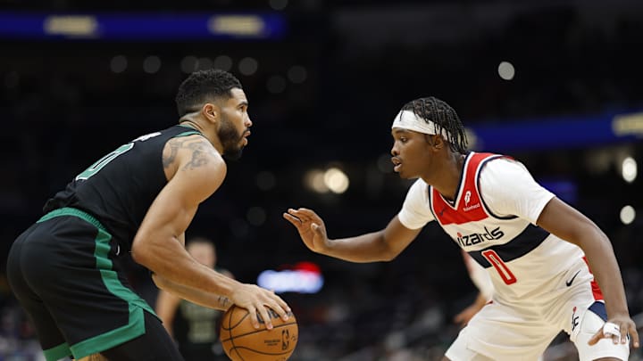 Oct 24, 2024; Washington, District of Columbia, USA; Boston Celtics forward Jayson Tatum (0) prepares to shoot the ball as Washington Wizards guard Bilal Coulibaly (0) defends in the first half at Capital One Arena. Mandatory Credit: Geoff Burke-Imagn Images