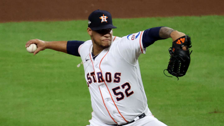 Houston Astros pitcher Bryan Abreu (52) throws