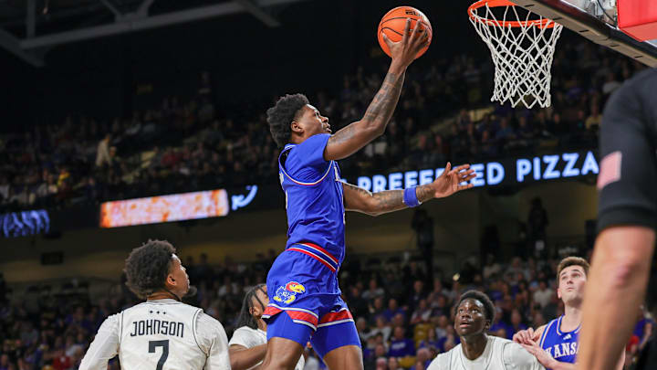 Jan 5, 2025; Orlando, Florida, USA; Kansas Jayhawks guard AJ Storr (2) goes to the basket during the second half against the UCF Knights at Addition Financial Arena. Mandatory Credit: Mike Watters-Imagn Images