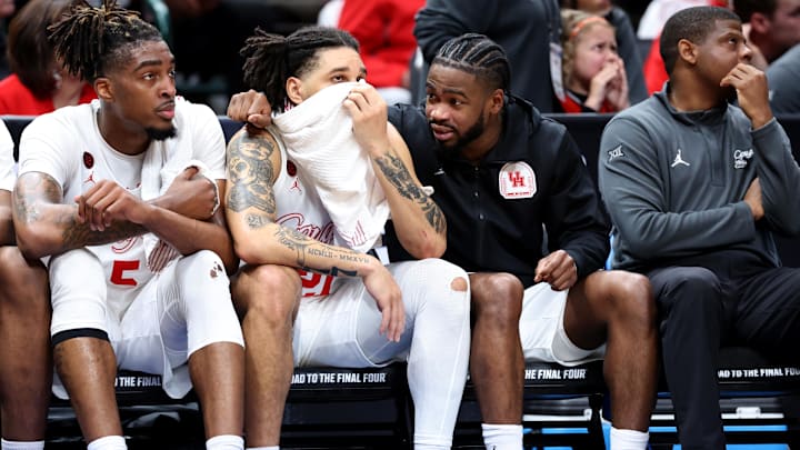 Mar 29, 2024; Dallas, TX, USA; Houston Cougars guard Jamal Shead (1) talks to guard Emanuel Sharp (21) on the bench.