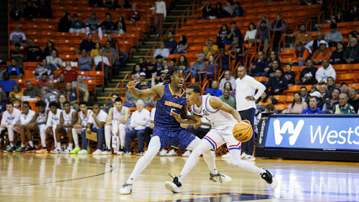 Feb 22, 2024; El Paso, Texas, USA; LA Tech Bulldogs Aggies guard Sean Newman Jr. (4) dribbles the ball up the court against UTEP Miners guard Corey Camper Jr. (4) in the second half at Don Haskins Center. Mandatory Credit: Ivan Pierre Aguirre-Imagn Images