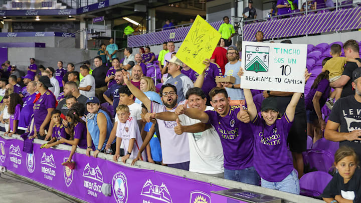 Jul 26, 2024; Orlando, Florida, USA; Fans wait for players to leave the pitch after the game between Orlando City and CF Montreal during the second half at INTER&CO Stadium. Mandatory Credit: Mike Watters-USA TODAY Sports