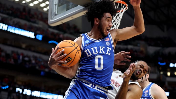 Mar 29, 2024; Dallas, TX, USA; Duke Blue Devils guard Jared McCain (0) rebounds against Houston Cougars forward J'Wan Roberts (13) during the first half in the semifinals of the South Regional of the 2024 NCAA Tournament at American Airlines Center. Mandatory Credit: Tim Heitman-USA TODAY Sports 