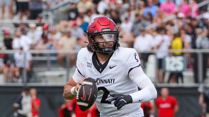 Oct 12, 2024; Orlando, Florida, USA; Cincinnati Bearcats quarterback Brendan Sorsby (2) looks to pass during the first quarter against the UCF Knights at FBC Mortgage Stadium. Mandatory Credit: Mike Watters-Imagn Images