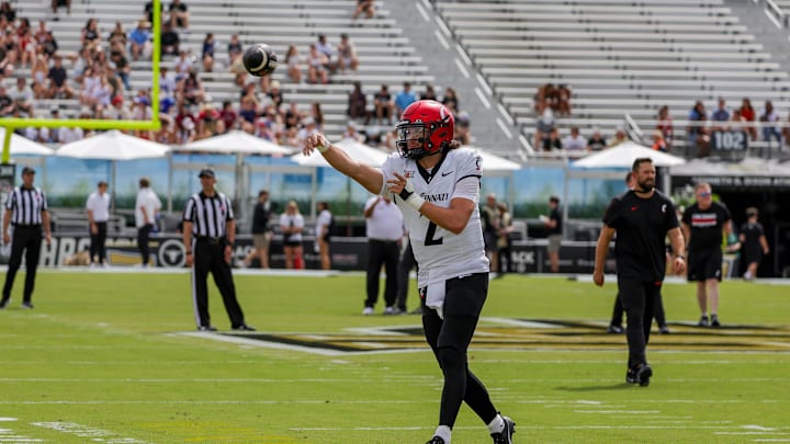 Oct 12, 2024; Orlando, Florida, USA; Cincinnati Bearcats quarterback Brendan Sorsby (2) warms up before the game against the UCF Knights at FBC Mortgage Stadium. Mandatory Credit: Mike Watters-Imagn Images Oct 12, 2024; Orlando, Florida, USA; Cincinnati Bearcats quarterback Brendan Sorsby (2) warms up before the game against the UCF Knights at FBC Mortgage Stadium. Mandatory Credit: Mike Watters-Imagn Images