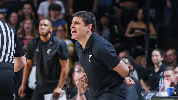 Feb 5, 2025; Orlando, Florida, USA; Cincinnati Bearcats head coach Wes Miller reacts during the first half against the UCF Knights at Addition Financial Arena. Mandatory Credit: Mike Watters-Imagn Images
