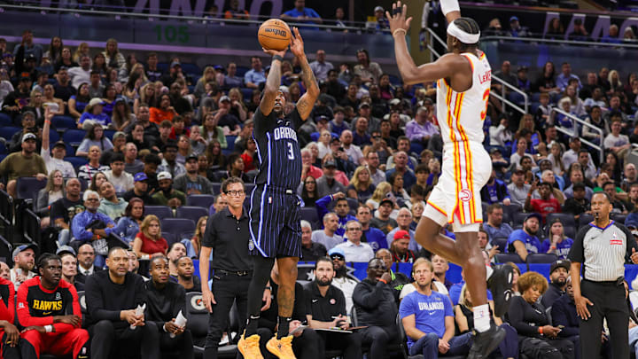 Apr 8, 2025; Orlando, Florida, USA; Orlando Magic guard Kentavious Caldwell-Pope (3) shoots a three point basket during the second half against the Atlanta Hawks at Kia Center. Mandatory Credit: Mike Watters-Imagn Images Apr 8, 2025; Orlando, Florida, USA; Orlando Magic guard Kentavious Caldwell-Pope (3) shoots a three point basket during the second half against the Atlanta Hawks at Kia Center. Mandatory Credit: Mike Watters-Imagn Images