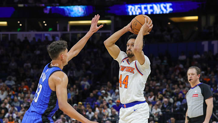 Dec 27, 2024; Orlando, Florida, USA; New York Knicks guard Landry Shamet (44) looks to pass against Orlando Magic forward Tristan da Silva (23) during the second quarter at Kia Center. Mandatory Credit: Mike Watters-Imagn Images