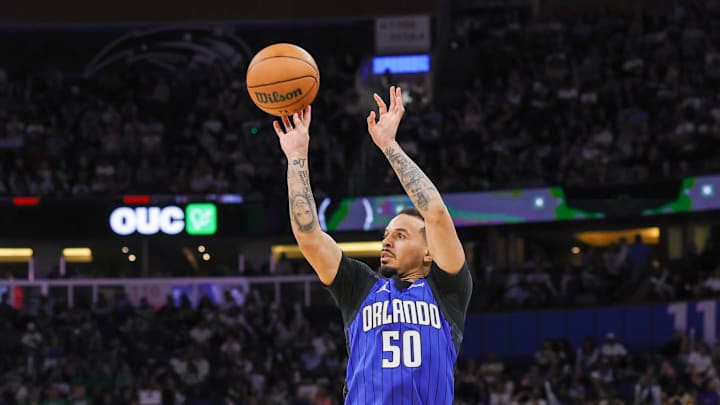 Apr 9, 2025; Orlando, Florida, USA; Orlando Magic guard Cole Anthony (50) shoots a three point basket during the second half against the Boston Celtics at Kia Center. Mandatory Credit: Mike Watters-Imagn Images