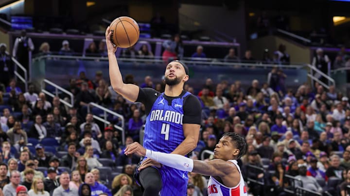Jan 25, 2025; Orlando, Florida, USA; Orlando Magic guard Jalen Suggs (4) is fouled by Detroit Pistons guard Marcus Sasser (25) during the second half at Kia Center. Mandatory Credit: Mike Watters-Imagn Images Jan 25, 2025; Orlando, Florida, USA; Orlando Magic guard Jalen Suggs (4) is fouled by Detroit Pistons guard Marcus Sasser (25) during the second half at Kia Center. Mandatory Credit: Mike Watters-Imagn Images