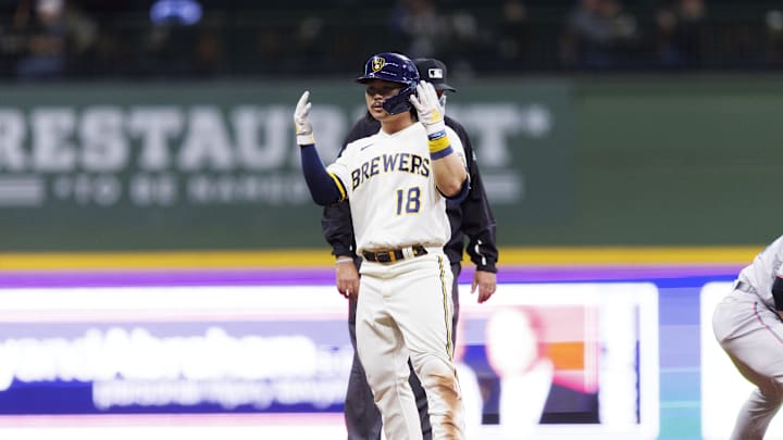Milwaukee Brewers first baseman Keston Hiura (18) reacts at second base after hitting an RBI double during the second inning against the Miami Marlins at American Family Field in 2022.