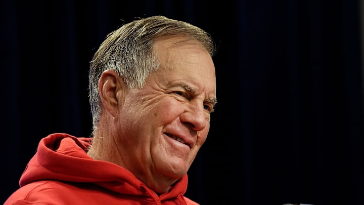 Bill Belichick smiles during questions at a press conference. Bill Belichick smiles during questions at a press conference.