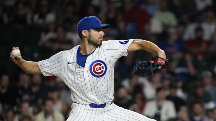 Aug 4, 2024; Chicago, Illinois, USA; Chicago Cubs pitcher Julian Merryweather (66) throws the ball against the St. Louis Cardinals during the ninth inning at Wrigley Field. Aug 4, 2024; Chicago, Illinois, USA; Chicago Cubs pitcher Julian Merryweather (66) throws the ball against the St. Louis Cardinals during the ninth inning at Wrigley Field.