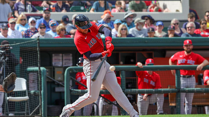 Feb 27, 2025; Lakeland, Florida, USA; Boston Red Sox center fielder Trayce Thompson (37) hits a double during the fifth inning against the Detroit Tigers at Publix Field at Joker Marchant Stadium. Mandatory Credit: Mike Watters-Imagn Images