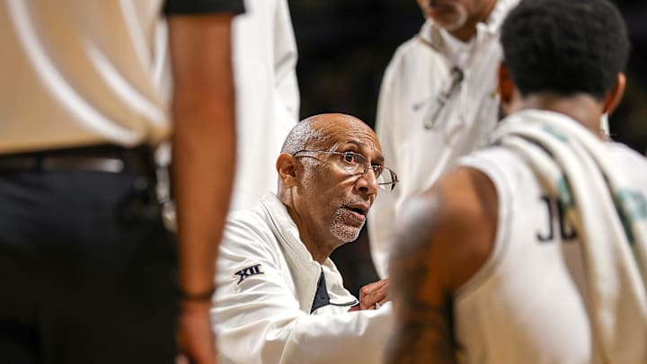 Mar 5, 2025; Orlando, Florida, USA; UCF Knights head coach Johnny Dawkins talks to the team in the second half during a timeout against the Oklahoma State Cowboys at Addition Financial Arena. Mandatory Credit: Mike Watters-Imagn Images Mar 5, 2025; Orlando, Florida, USA; UCF Knights head coach Johnny Dawkins talks to the team in the second half during a timeout against the Oklahoma State Cowboys at Addition Financial Arena. Mandatory Credit: Mike Watters-Imagn Images