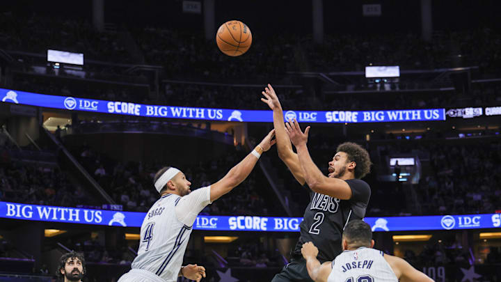 Dec 29, 2024; Orlando, Florida, USA; Brooklyn Nets forward Cameron Johnson (2) shoots the ball over Orlando Magic guard Jalen Suggs (4) during the second quarter at Kia Center. Mandatory Credit: Mike Watters-Imagn Images Dec 29, 2024; Orlando, Florida, USA; Brooklyn Nets forward Cameron Johnson (2) shoots the ball over Orlando Magic guard Jalen Suggs (4) during the second quarter at Kia Center. Mandatory Credit: Mike Watters-Imagn Images