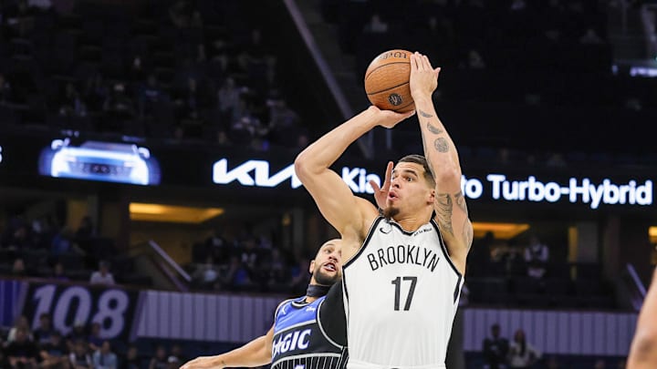 Nov 14, 2025; Orlando, Florida, USA; Brooklyn Nets forward Michael Porter Jr. (17) shoots in front of Orlando Magic guard Jalen Suggs (4) during the first quarter at Kia Center. Mandatory Credit: Mike Watters-Imagn Images Nov 14, 2025; Orlando, Florida, USA; Brooklyn Nets forward Michael Porter Jr. (17) shoots in front of Orlando Magic guard Jalen Suggs (4) during the first quarter at Kia Center. Mandatory Credit: Mike Watters-Imagn Images
