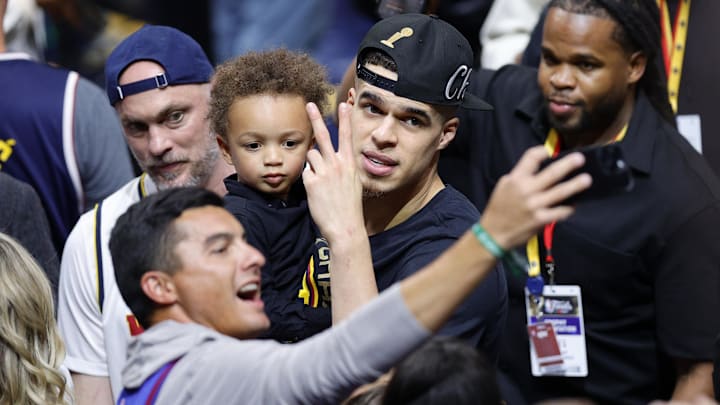 Jun 12, 2023; Denver, Colorado, USA; Denver Nuggets forward Michael Porter Jr. (1) celebrates after winning the 2023 NBA Championship against the Miami Heat at Ball Arena. Mandatory Credit: Isaiah J. Downing-Imagn Images