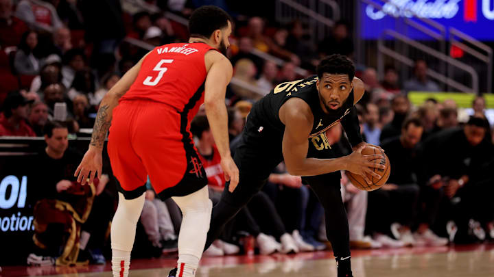 Jan 22, 2025; Houston, Texas, USA; Cleveland Cavaliers guard Donovan Mitchell (45) handles the ball against Houston Rockets guard Fred VanVleet (5) during the first quarter at Toyota Center. Mandatory Credit: Erik Williams-Imagn Images Jan 22, 2025; Houston, Texas, USA; Cleveland Cavaliers guard Donovan Mitchell (45) handles the ball against Houston Rockets guard Fred VanVleet (5) during the first quarter at Toyota Center. Mandatory Credit: Erik Williams-Imagn Images
