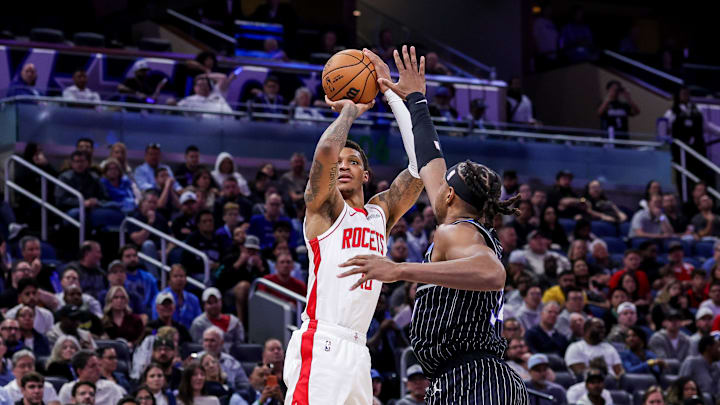 Feb 26, 2026; Orlando, Florida, USA; Houston Rockets forward Jabari Smith Jr. (10) shoots against Orlando Magic center Wendell Carter Jr. (34) during the second half at Kia Center. Mandatory Credit: Mike Watters-Imagn Images