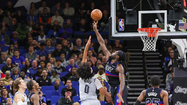 Nov 23, 2024; Orlando, Florida, USA; Detroit Pistons center Isaiah Stewart (28) blocks a shot by Orlando Magic guard Anthony Black (0) during the second quarter at Kia Center. Mandatory Credit: Mike Watters-Imagn Images
