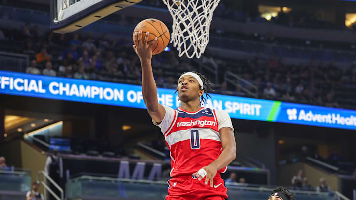 Nov 10, 2024; Orlando, Florida, USA; Washington Wizards guard Bilal Coulibaly (0) lays up during the first quarter against the Orlando Magic at Kia Center. Mandatory Credit: Mike Watters-Imagn Images