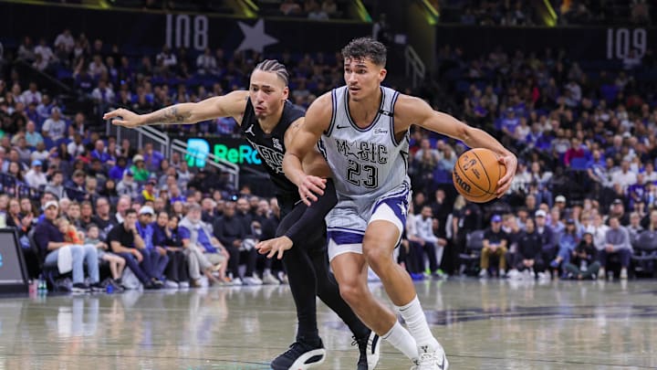 Dec 29, 2024; Orlando, Florida, USA; Brooklyn Nets forward Jalen Wilson (22) defends Orlando Magic forward Tristan da Silva (23) during the second half at Kia Center. Mandatory Credit: Mike Watters-Imagn Images Dec 29, 2024; Orlando, Florida, USA; Brooklyn Nets forward Jalen Wilson (22) defends Orlando Magic forward Tristan da Silva (23) during the second half at Kia Center. Mandatory Credit: Mike Watters-Imagn Images