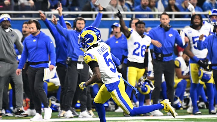 Jan 14, 2024; Detroit, Michigan, USA; Los Angeles Rams wide receiver Tutu Atwell (5) runs after a catch for a touchdown during the first half of a 2024 NFC wild card game against the Detroit Lions at Ford Field. Mandatory Credit: Lon Horwedel-Imagn Images