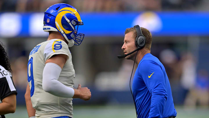 Sep 18, 2022; Inglewood, California, USA;  Los Angeles Rams quarterback Matthew Stafford (9) talks with head coach Sean McVay on the sidelines in the first half against the Atlanta Falcons at SoFi Stadium. Mandatory Credit: Jayne Kamin-Oncea-Imagn Images