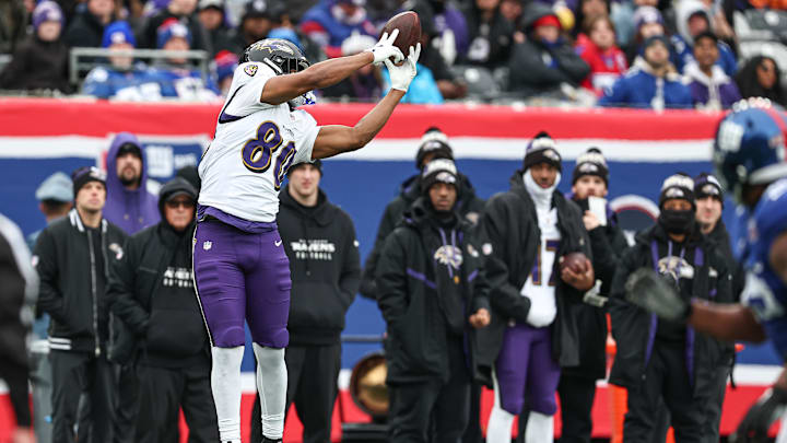 Dec 15, 2024; East Rutherford, New Jersey, USA; Baltimore Ravens tight end Isaiah Likely (80) makes a catch during the first half against the New York Giants at MetLife Stadium. Mandatory Credit: Vincent Carchietta-Imagn Images