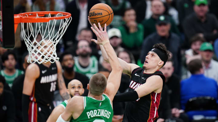 Apr 24, 2024; Boston, Massachusetts, USA; Miami Heat guard Tyler Herro (14) drives to the basket - David Butler II/USA TODAY Sports