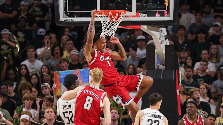 Nov 12, 2024; Orlando, Florida, USA; Florida Atlantic Owls forward Kaleb Glenn (1) dunks during the second half against the UCF Knights at Addition Financial Arena. Mandatory Credit: Mike Watters-Imagn Images