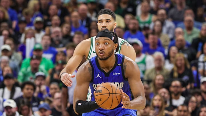 Apr 25, 2025; Orlando, Florida, USA; Orlando Magic center Wendell Carter Jr. (34) looks to pass against the Boston Celtics during the second half of game three of first round for the 2024 NBA Playoffs at Kia Center. Mandatory Credit: Mike Watters-Imagn Images