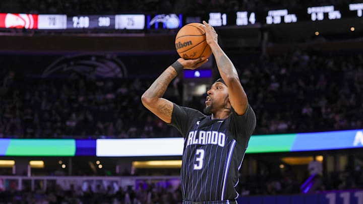 Apr 8, 2025; Orlando, Florida, USA; Orlando Magic guard Kentavious Caldwell-Pope (3) shoots a three point basket during the second half against the Atlanta Hawks at Kia Center. Mandatory Credit: Mike Watters-Imagn Images Apr 8, 2025; Orlando, Florida, USA; Orlando Magic guard Kentavious Caldwell-Pope (3) shoots a three point basket during the second half against the Atlanta Hawks at Kia Center. Mandatory Credit: Mike Watters-Imagn Images